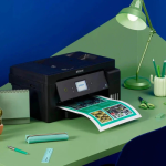 Epson EcoTank L14150 Wi-Fi color inkjet printer on office desk