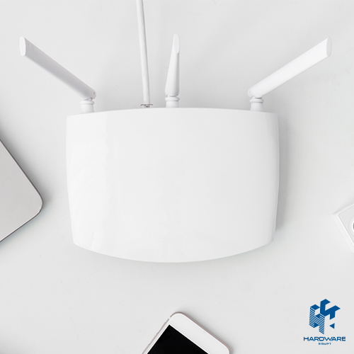 TP-Link Access Point device on office wall