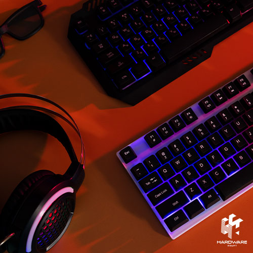 Gaming notebook on a desk with RGB keyboard lighting