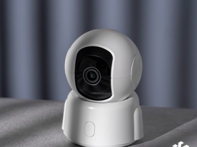 Modern home security camera installed on a wall, protecting a smart home.