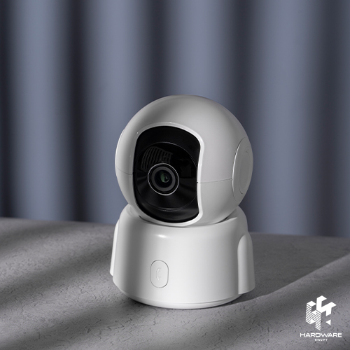 Modern home security camera installed on a wall, protecting a smart home.